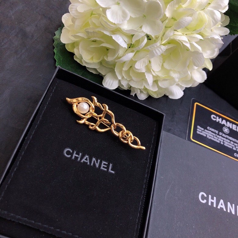 Ch*el brooches